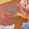 Frusta piccola da cucina in legno e silicone rosa