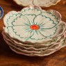 Piattino frutta in ceramica a forma di fiore con bordo rosa