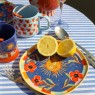 Piattino in ceramica blu con sole e fiori | Smilza