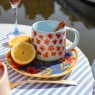 Tazza mug in ceramica azzurra con papaveri