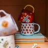 Tazza mug in ceramica azzurra con papaveri