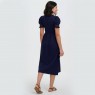 Abito midi in jersey blu navy con fiori e palme tropicali |