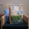 Zaino in materiale riciclato beige con patta a quadretti |